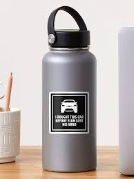 Trending ‘Tesla Regret’ sticker on a sleek gray water bottle! Bold black and white design reads: ‘I BOUGHT MY CAR BEFORE ELON LOST HIS MIND.’ Perfect for Tesla owners who have second thoughts—funny, stylish, and making waves online!🔥 #Tesla #ElonMusk #StickerTrend